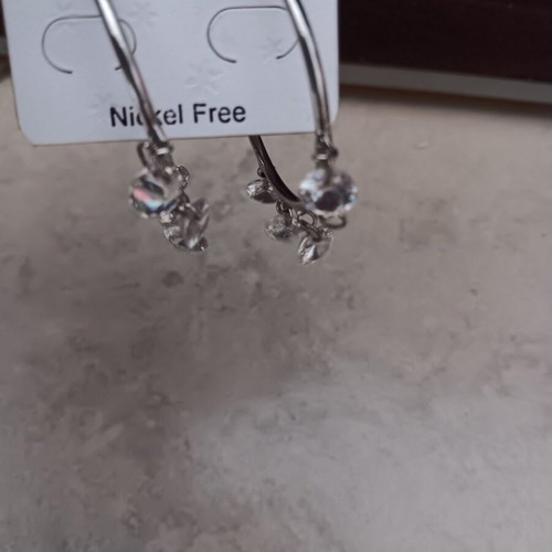 Earrings new, silver color, not silver material