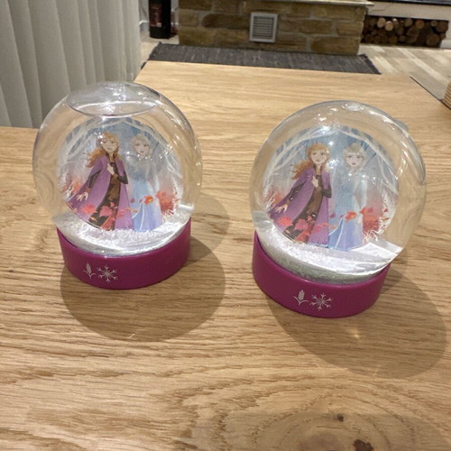Disney snow globes Elsa and Anna like new
