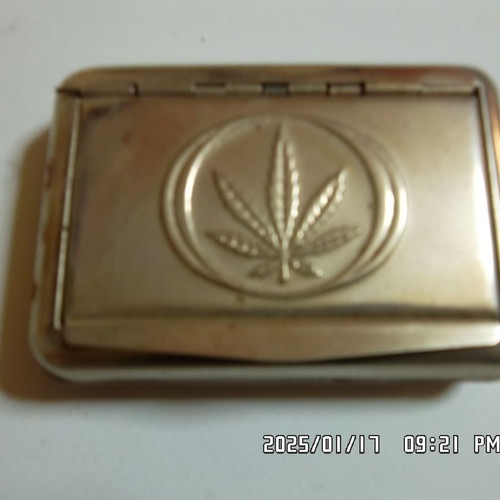 Tobacco case with paper holder used