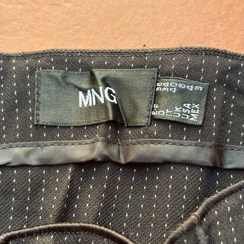 MNG black asymmetric skirt like new with small pattern size M