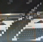 Olympia typewriter used with carrying case, missing handle