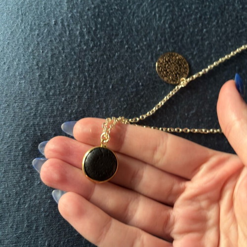 Gold pendant with black stone like new made of stainless steel