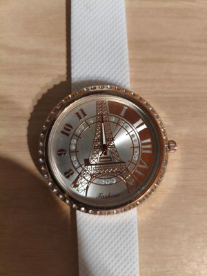 Watch with Eiffel Tower design used, white