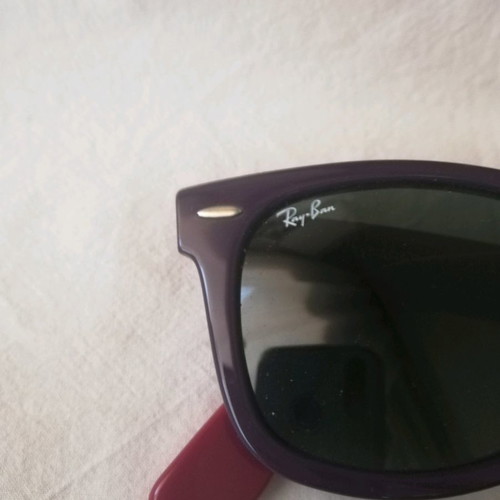 Ray Ban sunglasses used with purple frame and black-blue lenses