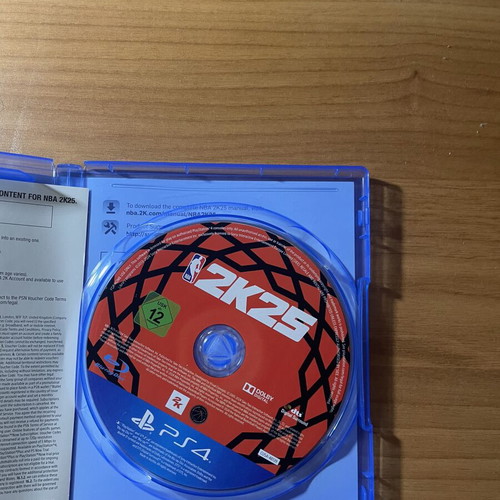 PlayStation 4 console with 2 controllers, NBA 2K25, FIFA 20, Minecraft
