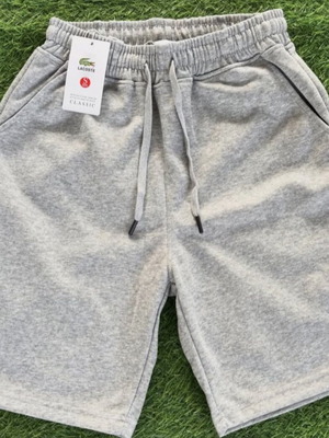 Lacoste shorts in excellent condition, size L