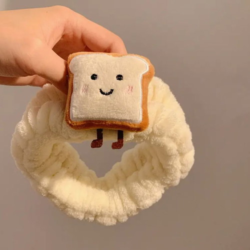 Headband Tostaki new with plush texture and cute design