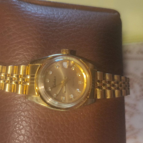 Calbas vintage ladies quartz watch, gold tone, date display