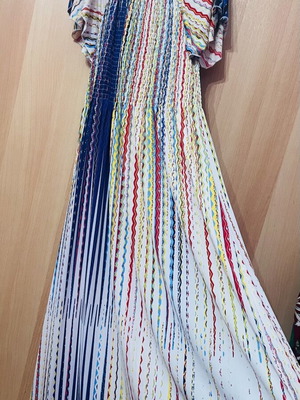 Colorful long dress elastic fabric fits size small and medium like new
