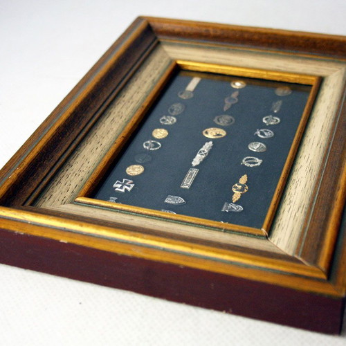 Frame with 27 old German Nazi military badges from World War II like new