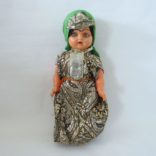 Vintage souvenir doll with traditional oriental costume used