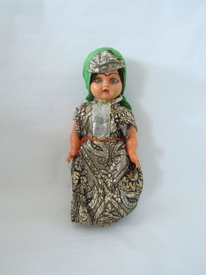 Vintage souvenir doll with traditional oriental costume used