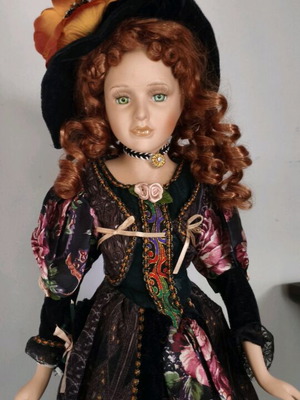 Porcelain doll 60 cm height like new with stand
