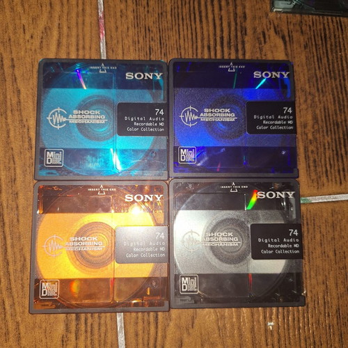 MiniDisc collection with Sony storage base, untested