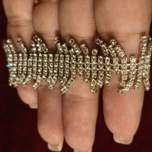 Bracelet with rhinestones like new, wavy design