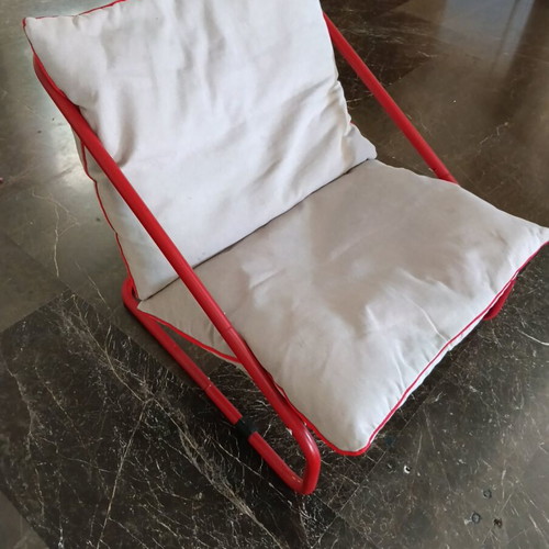 Outdoor and indoor armchair with cushions used