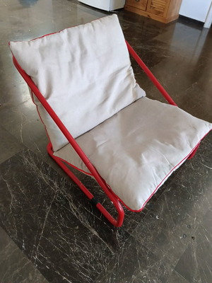 Outdoor and indoor armchair with cushions used