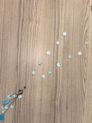 Long handmade necklace new with white cord and turquoise tassel