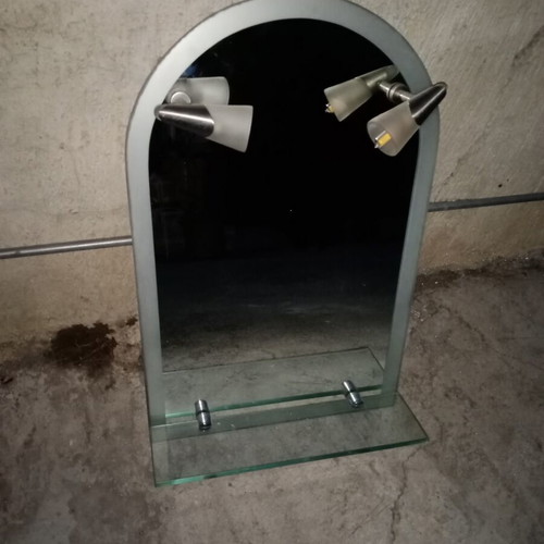 Semi-circular bathroom mirror used with 2 lights and shelf