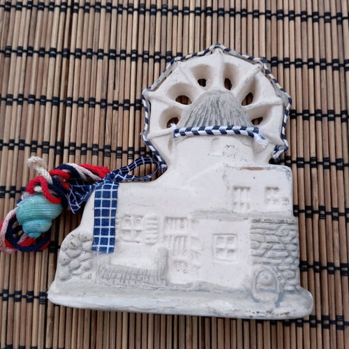 Clay wall decor lighthouse used
