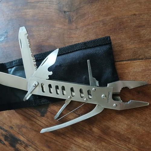 Folding stainless steel multitool new with case