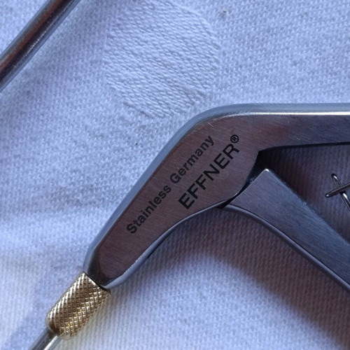 Surgical instruments used, stainless steel with gold-plated handles