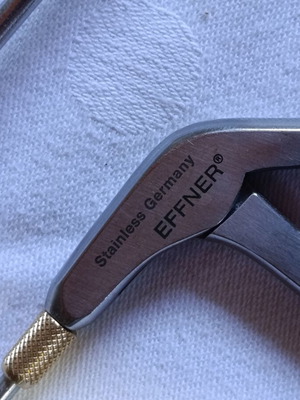 Surgical instruments used, stainless steel with gold-plated handles