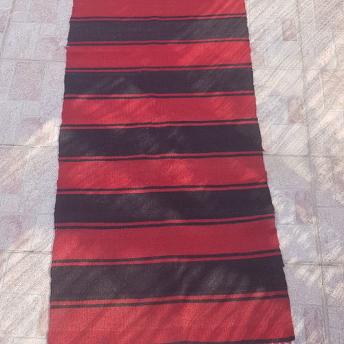 Handmade wool loom rug used