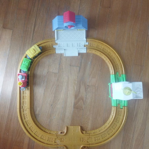 Fisher Price train used with tracks, buildings and carriages
