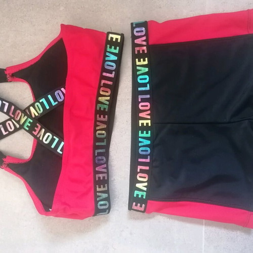 Girls' beach set used, swimsuit with crisscross back and shorts