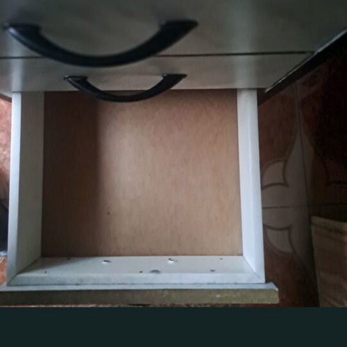 Wooden cabinet on wheels with 4 drawers
