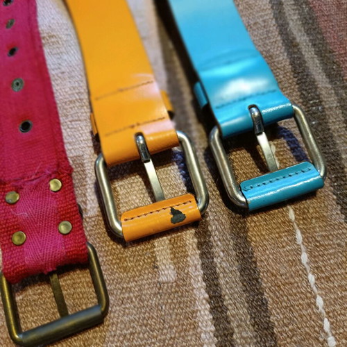 Three Benetton belts used, two leather and one fabric