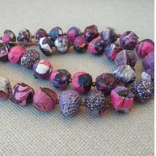 Long handmade bow tie necklace in purple and pink