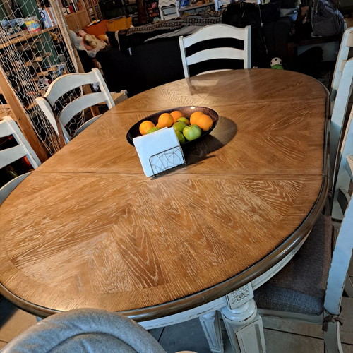 Ashley dining set like new with 6 chairs, round and extendable