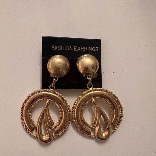 Dangling earrings like new, gold-colored