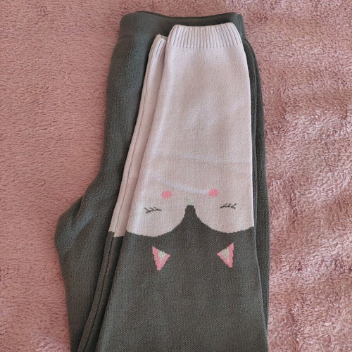Knitted leggings used for girls age 10, charcoal with designs