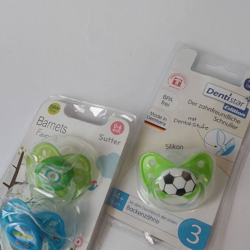 Set of new pacifiers and soothers