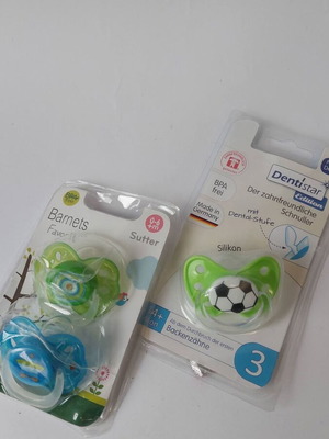 Set of new pacifiers and soothers
