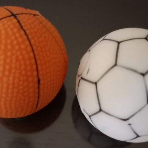Set of 2 water-squirting balls with funny faces, like new