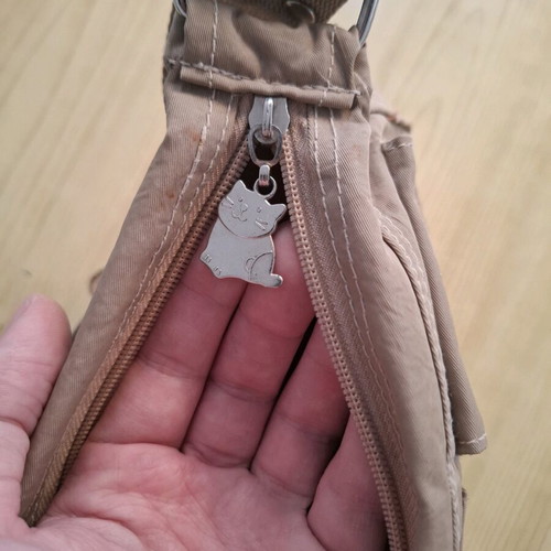 Women's shoulder bag used, beige with metal details