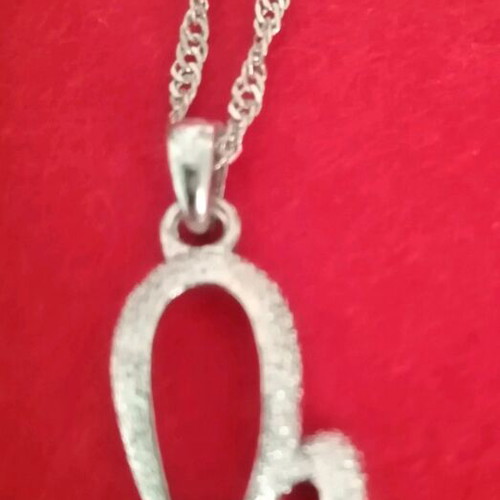 Necklace and matching earrings like new with stone, silver color