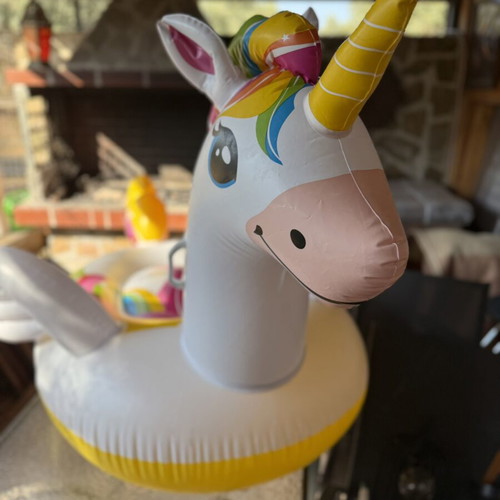 Inflatable Unicorn Pool Float like new, colorful rainbow design