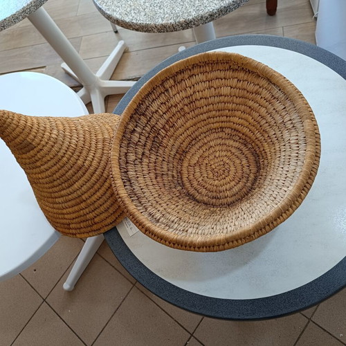 Handmade woven basket with conical lid used, natural fibers