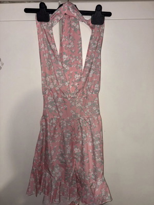 Fullah Sugah summer jumpsuit with open back, pink and white