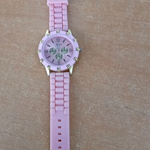 Pink watch with gold used, needs battery