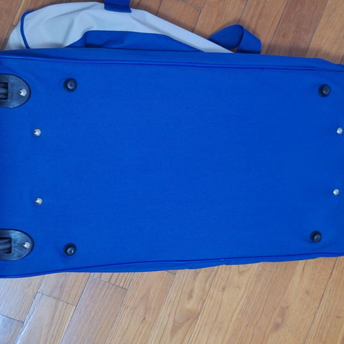 Travel sack used with handle and wheels, beige and blue