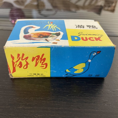 Tin duck vintage toy used with original box, Chinese made