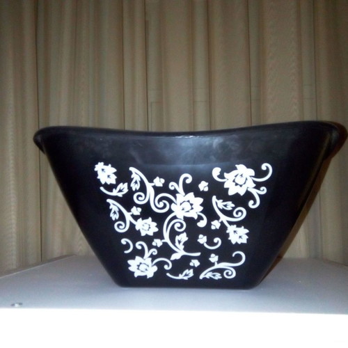 Black and white plant pot used, medium size, plastic