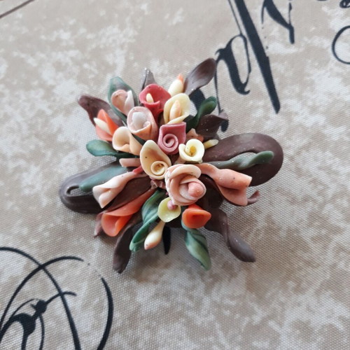 Handmade pin used, polymer clay