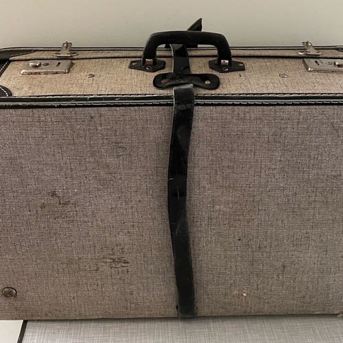 Retro travel suitcase used vintage with fabric lining